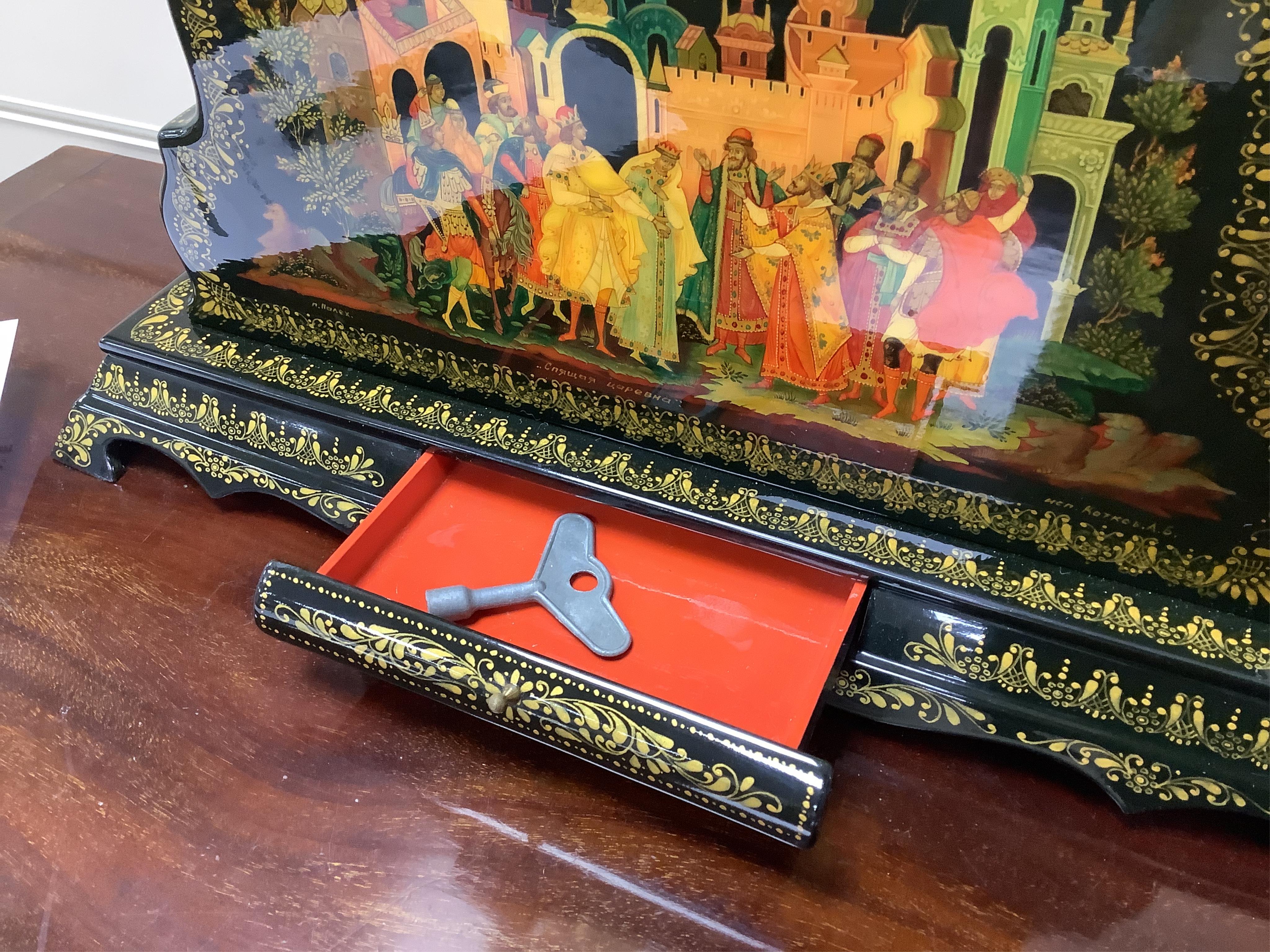 A Becha Russian hand painted black lacquer large mantel clock, 36cm high x 44cm wide